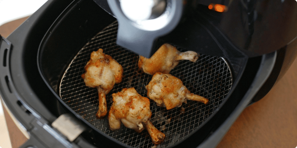 Préparer un poulet tendre à l'air fryer : astuces et conseils